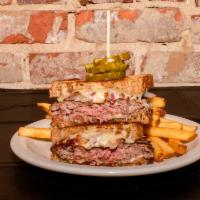 Patty Melt · An 8 oz. burger topped with swiss cheese, sauteed onions, and mayo. Served on a rye bread, w...