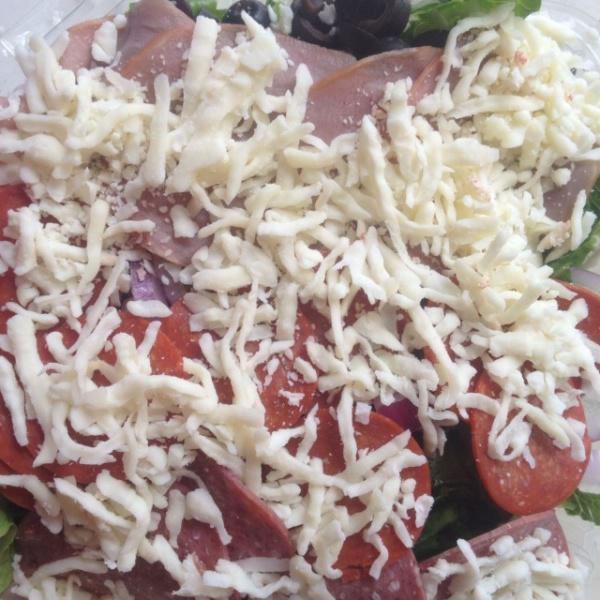 Anti-Pasto Salad · A fresh garden salad with salami, pepperoni, ham and mozzarella.