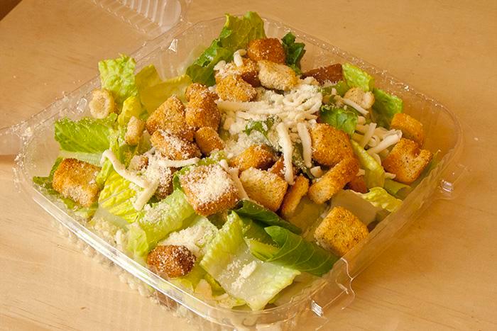 Caesar Salad · Romaine lettuce, traditional Caesar dressing with Parmesan cheese and croutons.