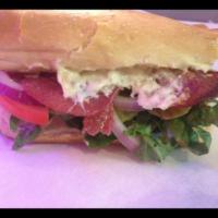 Salami Sandwich · Served with lettuce, onion, tomato, pickles, mustard, mayo, mozzarella cheese and Mexican ja...