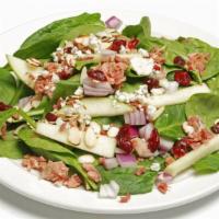 Spinach Salad · Spinach, bacon bits, green apples, red onions, craisins, almonds, blue cheese and balsamic v...