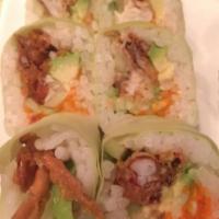 Spider Roll · Soft shell crab, avocado, cucumber, soy paper and masago.