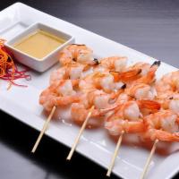 4 BBQ Shrimp · Grilled shrimp skewers marinated in Thai spices and grilled with spicy lime sauce.