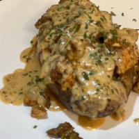 Chicken & Steak Chimichurri Baked Potato · Chicken breast and steak marinated and pan in a chimichurri sauce with veggies resting insid...