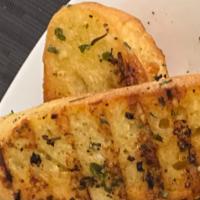 Garlic Buttered Toast · Two sliced and buttered garlic toasts.