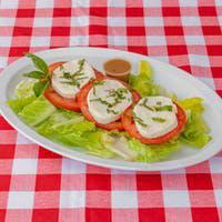 Caprese Salad · Comes with fresh mozzarella, tomato and basil on romaine with balsamic dressing.