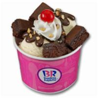 Warm Brownie Sundae · Warm brownie, choice of two 2.5 oz. scoops of ice cream and topping.