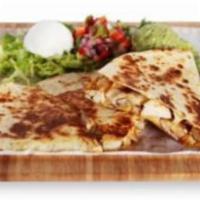 Quesadilla · Your choice of grilled meats or seafood, melted cheese and tortilla, and served with fresh h...