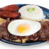 Bistec a lo Pobre · Tender steak, fried plantains, and fried eggs. 
