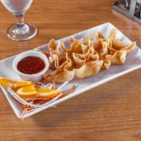 Crab Rangoon  · 8 pieces. Fried wonton wrapper filled with a blend of cream cheese, imitation crab meat, and...