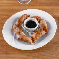 Dumplings  · Steamed or fried dumplings stuffed with minced pork and vegetables served with homemade dump...