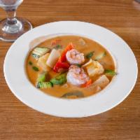 Pineapple Curry Shrimp  · Red curry with shrimp, pineapple, bell pepper, zucchini, carrots and basil leaves.