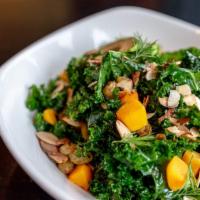 Kale Salad · Shaved broccoli, farro, toasted almonds, fresh herbs, almond-lime dressing, oranges, and cri...