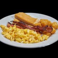 Fresh Start Breakfast · Two eggs, bone-in ham or Applewood smoked bacon, half Cuban toast, tater tots, and small cof...