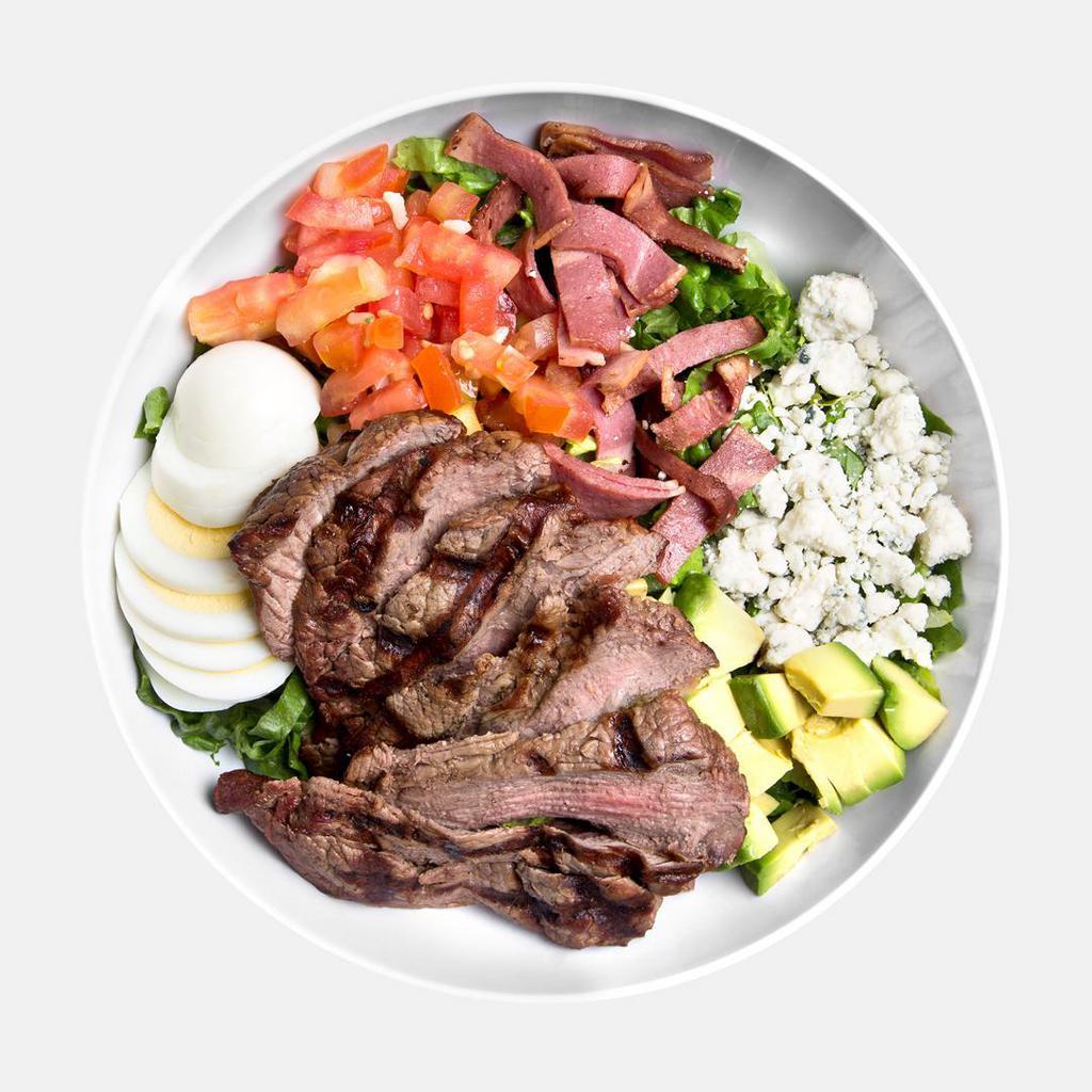 PH Chopped Salad · Certified Angus beef steak, romaine lettuce, tomatoes, avocado, all-natural turkey bacon bits, hard-boiled egg, blue cheese crumbles, and balsamic vinaigrette.