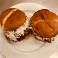 Pull Pork Sandwich · A Smoked Pork Butt topped with Wesley's BBQ sauce and coke slaw. 
Comes with your choice of ...