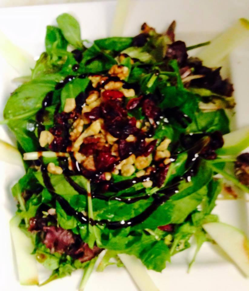 Luigi's Salad · Mixed greens, sliced apples, walnuts, cranberries and Gorgonzola cheese with balsamic glaze.