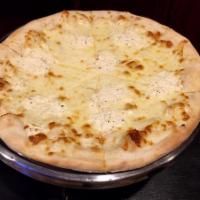Pizza Bianca · No sauce. Ricotta, mozzarella cheese, fresh broccoli and tomato.