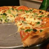 Margherita Fresca Pizza · No sauce. Fresh sliced tomato, fresh basil, mozzarella and Romano olive oil.