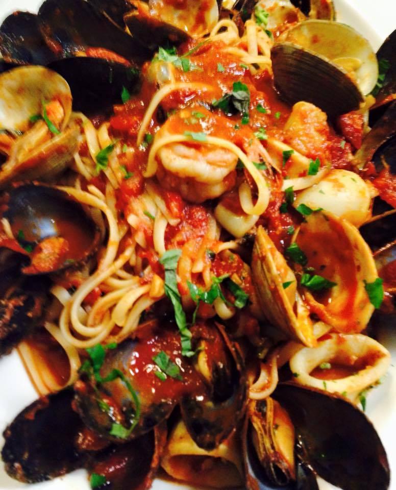 Seafood Combination - Dinner · Made for the seafood lover: clams, mussels, shrimp, and calamari in a marinara sauce over linguine. Served with bread