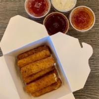 Mozzarella Sticks · (8 pieces) Lightly breaded and served with choice of dipping sauce.