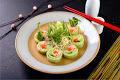  Cucumber Special Roll · Real crab, gobo, avocado, bean sprout wrapped with cucumber and house sauce.