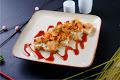 Kingster Roll · Baked crawfish, shrimp,avocado and masago. Green onion on top with sweet sauce.