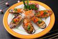 Baked Green Mussel · Mussels broiled with sesame mayosauce.