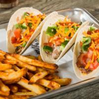 BBQ Taco Trio · 1 pulled pork, 1 pulled chicken and 1 smoked brisket taco each topped with cheddar cheese, d...