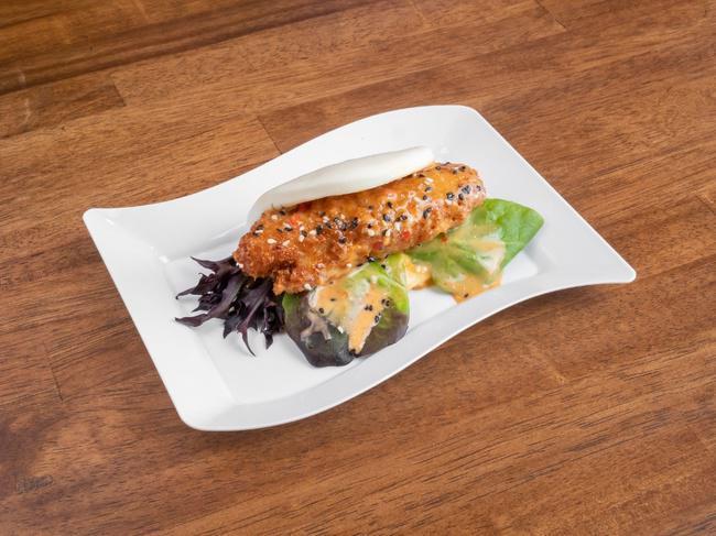 Sweet Heat · Crispy panko chicken tossed in our signature sweet heat sauce laid on a bed of spring mix and sprinkled with toasted sesame seeds