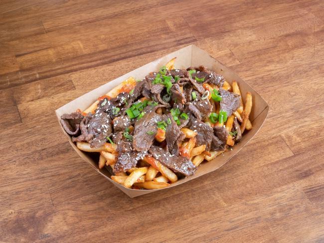 Loaded Fries · Sriracha, signature sweet heat sauce, green onions, mixed sesame seeds, and your choice of protein