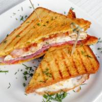 2 Eggs & Ham Sandwich · Fresh cooked eggs mixed with slices of ham on choice of bread.