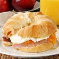 Ham, Egg, and Cheese Croissant · Fresh buttermilk croissants filled with eggs, ham slices, and choice of cheese.