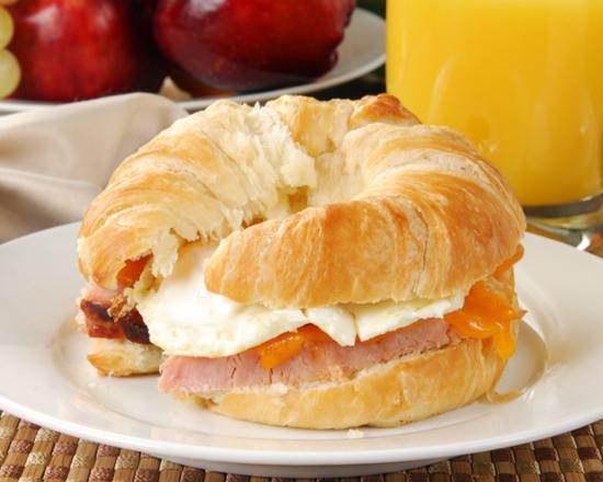 Ham, Egg, and Cheese Croissant · Fresh buttermilk croissants filled with eggs, ham slices, and choice of cheese.