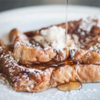 French Toast with Syrup · Fresh fluffy French toast topped with syrup.
