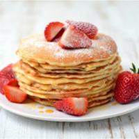Strawberry Pancakes · 2 pieces. Fluffy buttermilk pancakes with strawberries and syrup.