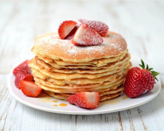 Strawberry Pancakes · 2 pieces. Fluffy buttermilk pancakes with strawberries and syrup.