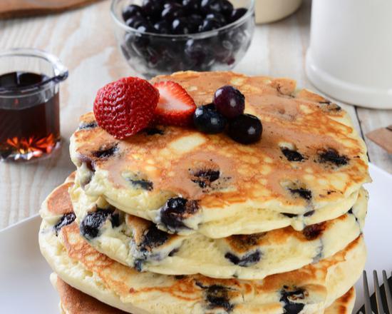 Blueberry Pancakes · 2 pieces. Fluffy buttermilk pancakes with blueberries and syrup.