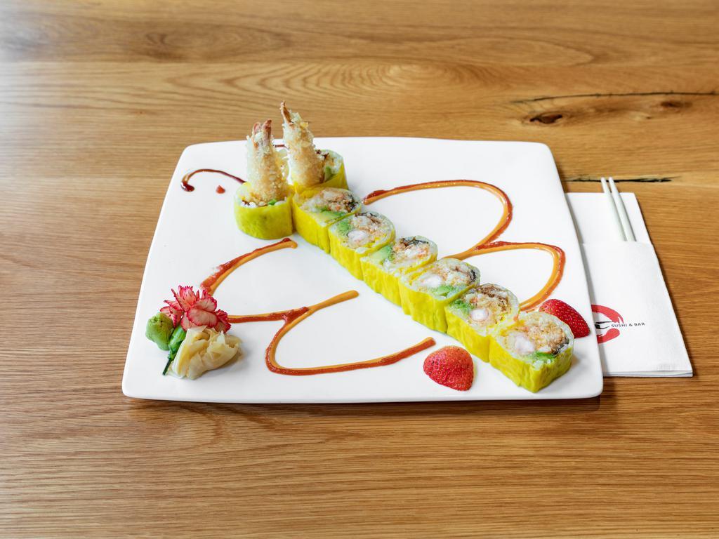 Ooi Roll · Spicy lobster salad, shrimp tempura, eel, avocado wrapped with soy paper, and honey sweet sauce.