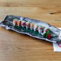 2019 Roll · Tuna, salmon, yellowtail, and asparagus topped with tuna, salmon, and yellowtail with chef’s...