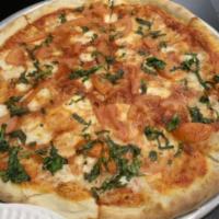 Margherita Pizza · Fresh mozzarella cheese, fresh tomatoes, basil.