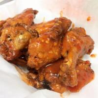 Chicken Wings · Served with carrots and celery sticks ranch or bleu cheese dressing. 8 wings.