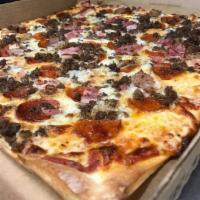 Big Meat Pizza · Pepperoni, Italian sausage, ham, bacon, and ground beef.