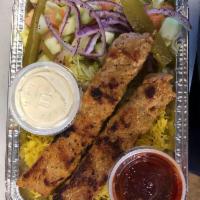 8. Chicken Kabab Plate · Chicken kabab, rice, tomato, lettuce, cucumber, onion, olive, pickles, feta cheese, dressing...