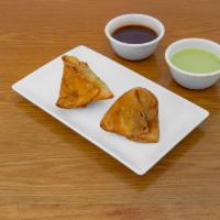 Chicken Samosa · A fried pastry with a savory potato filling.