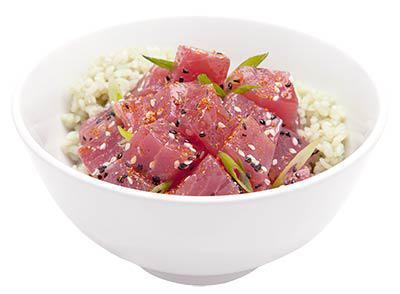Ahi Tuna Tower Bowl · Sushi rice, spicy tuna, crab meat, avocado, red tobiko, back tobiko, Masago, kizami nori, mango sauce, eel sauce, sweet chili sauce, wasabi aioli, and spicy mayo.