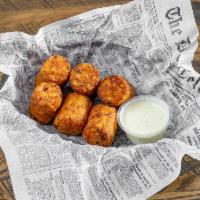 Cheddar Bacon Potato Barrels · Large tater tots blended with cheddar cheese and bacon, deep fried to a crispy golden brown ...