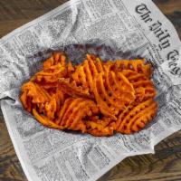 Sweet Potato Fries · Deep fried sweet potatoes, simple & delicious with a pinch of salt.