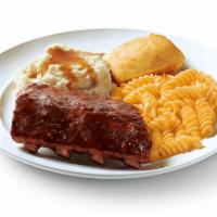 1/2 Order of Baby Back Ribs · Slow-cooked, fall-off-the-bone baby back ribs seasoned then brushed with a hickory BBQ sauce...