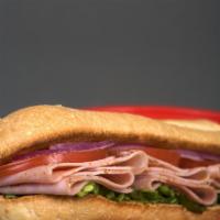 Ham and Cheese · Baked ham - dressed with provolone cheese, lettuce, tomato, onions, black pepper, oregano, o...